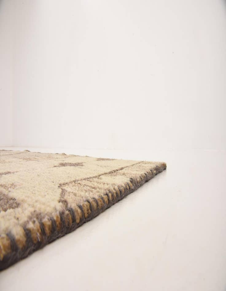 Detail image of  6' 5 x 9' 9  Hand Knotted Patchwork Wool Rug