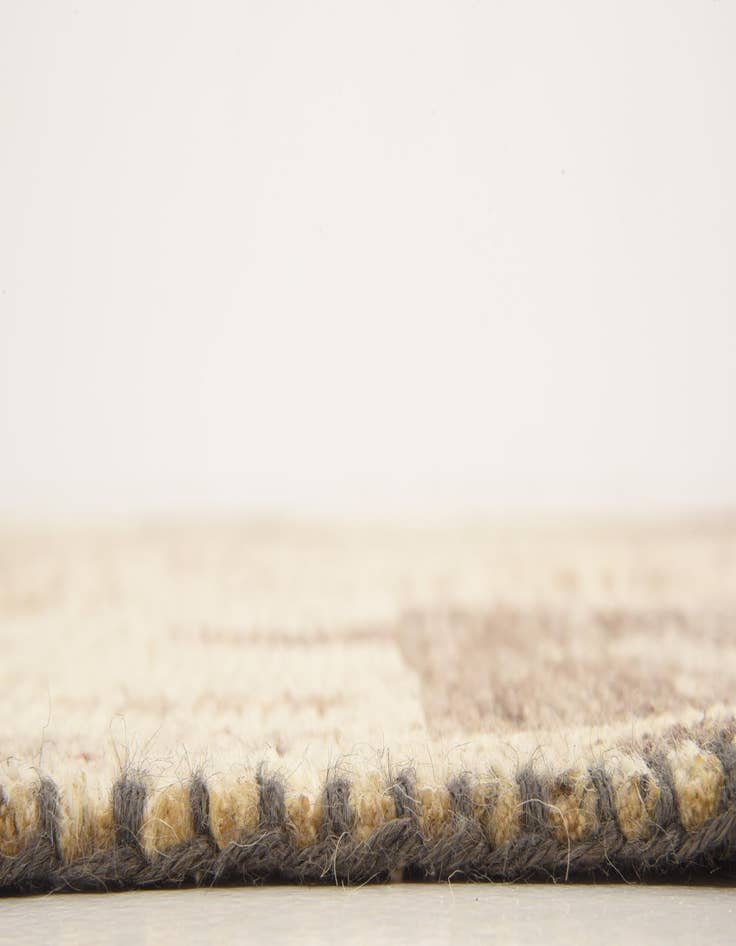 Detail image of  6' 5 x 9' 9  Hand Knotted Patchwork Wool Rug