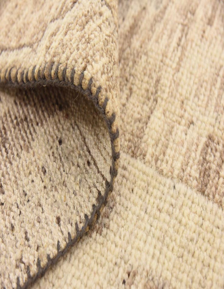 Detail image of  6' 5 x 9' 9  Hand Knotted Patchwork Wool Rug