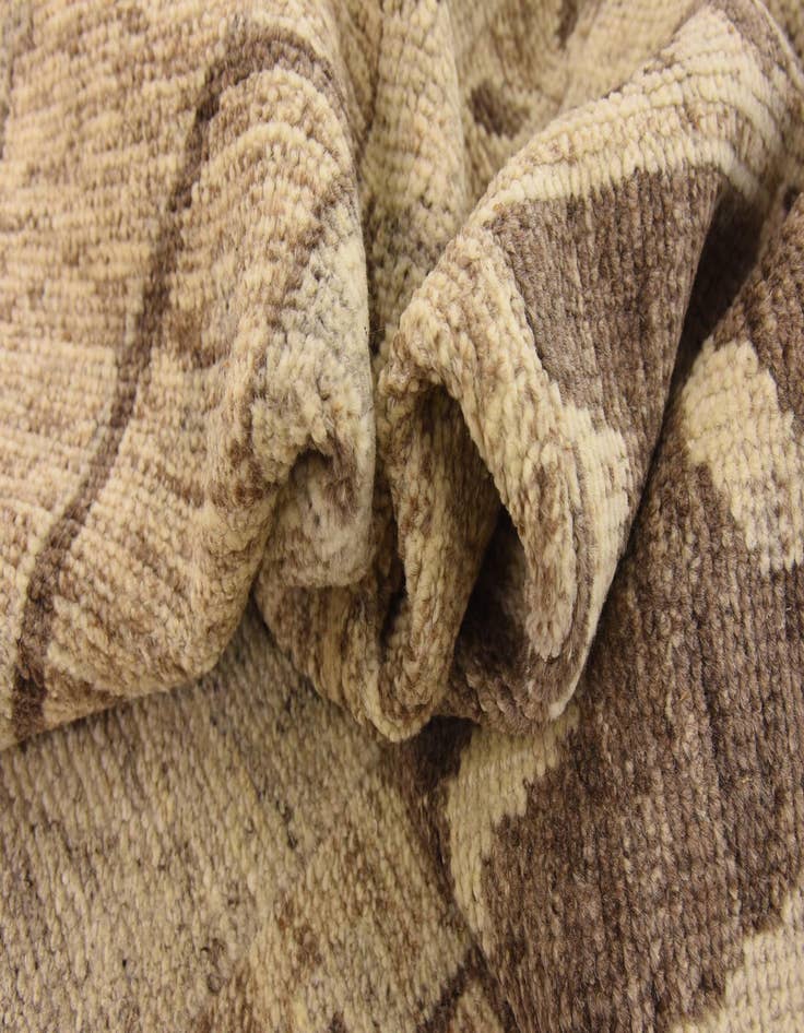 Detail image of  6' 5 x 9' 9  Hand Knotted Patchwork Wool Rug