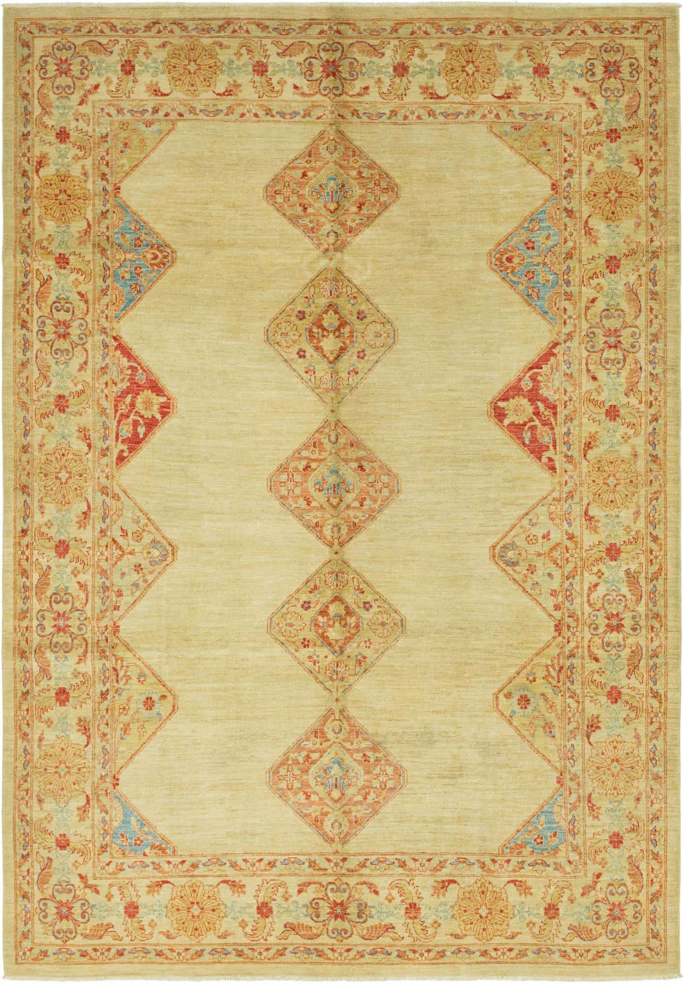 A 7x10 rectangular Peshawar Ziegler rug featuring a light brown field with a central column of diamond medallions and a detailed floral border in red, blue, and cream.