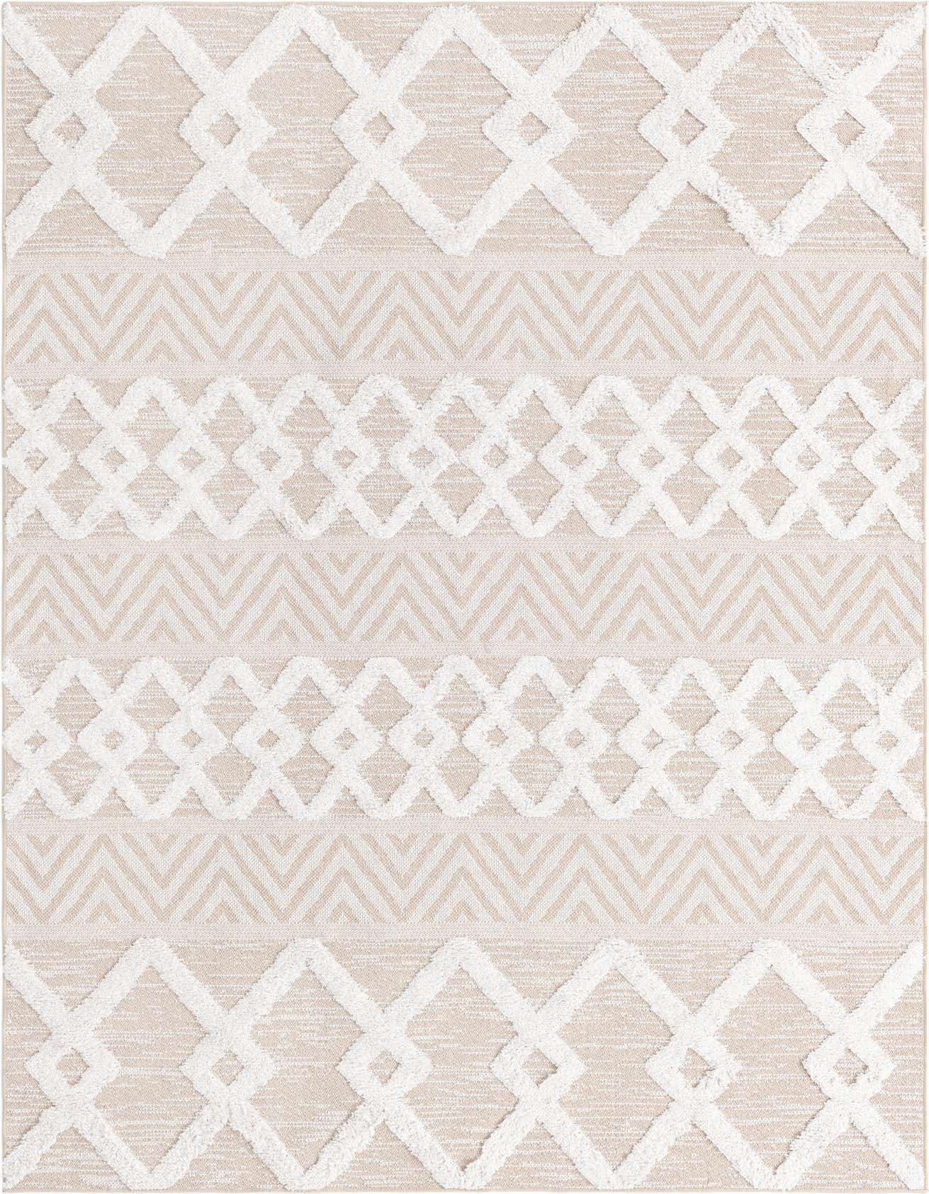 A 5x8 rectangular Sabrina Soto Casa rug featuring a tribal pattern of textured ivory diamonds and flatweave tan chevron stripes on a light brown background.
