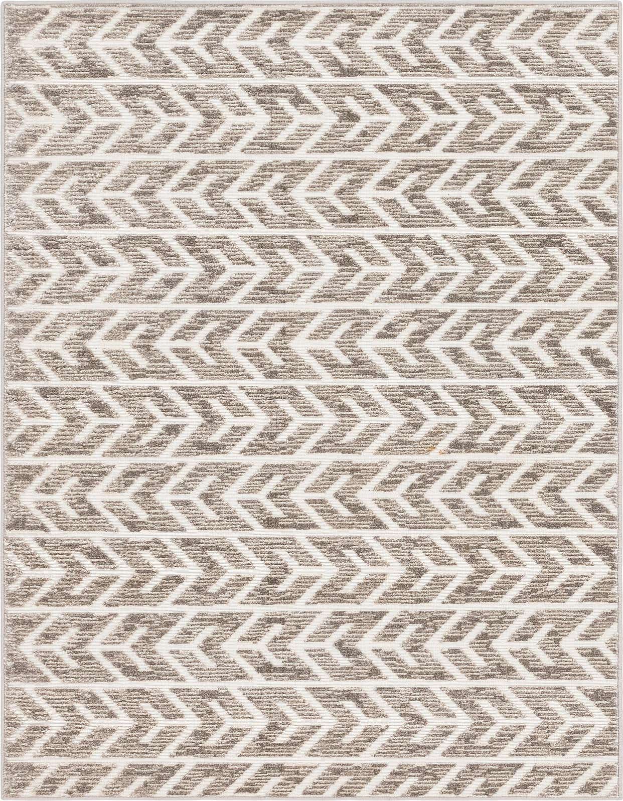 A rectangular 5x8 brown and ivory Southwestern-style rug with a textured high/low pile chevron pattern.