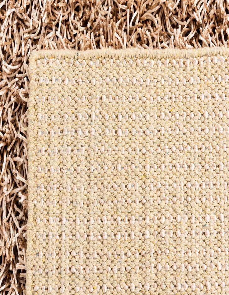 Detail image of  5' 2 x 6' 5  Hand Knotted Solid Shag Rug