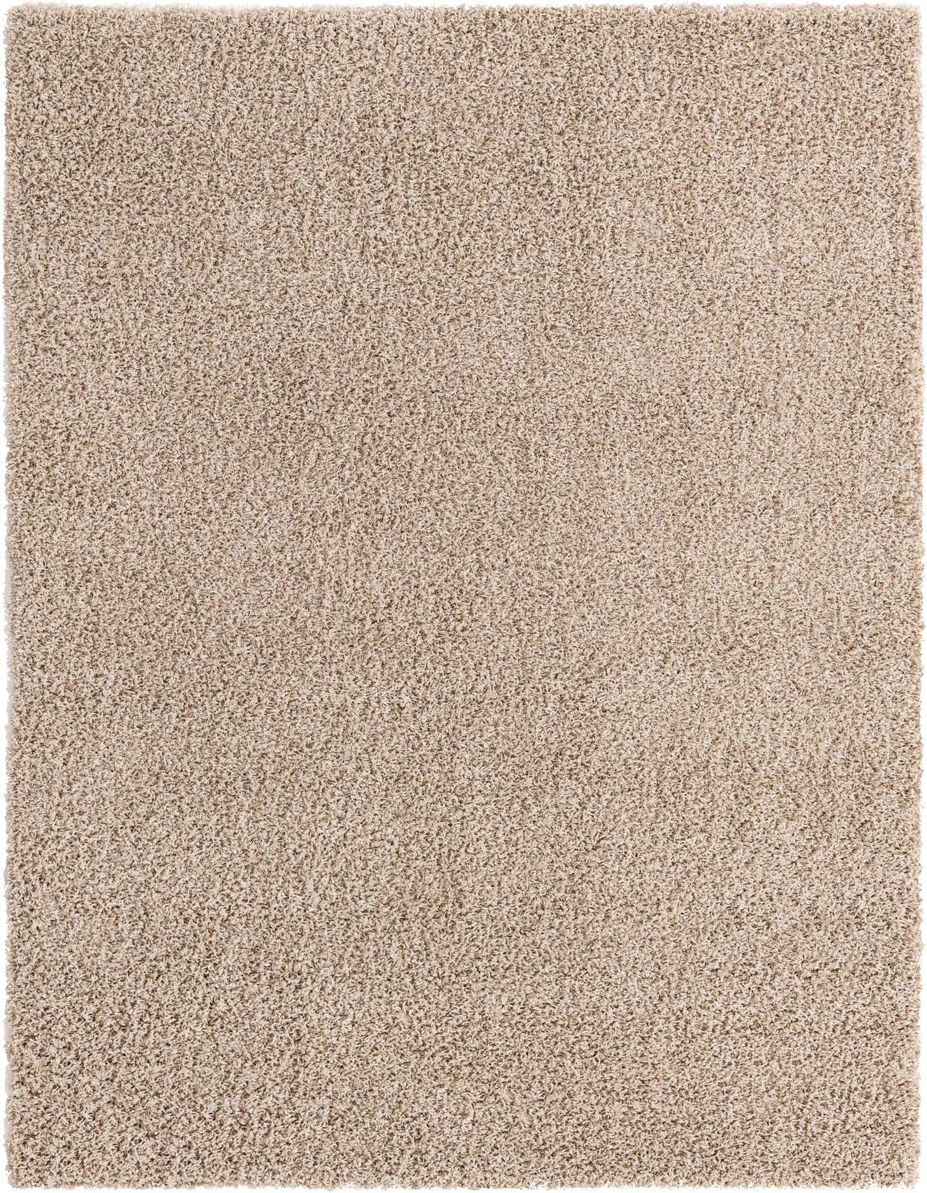 A 4x6 rectangular Solid Shag rug in a blend of brown and tan polypropylene, featuring a plush, modern textured pile.