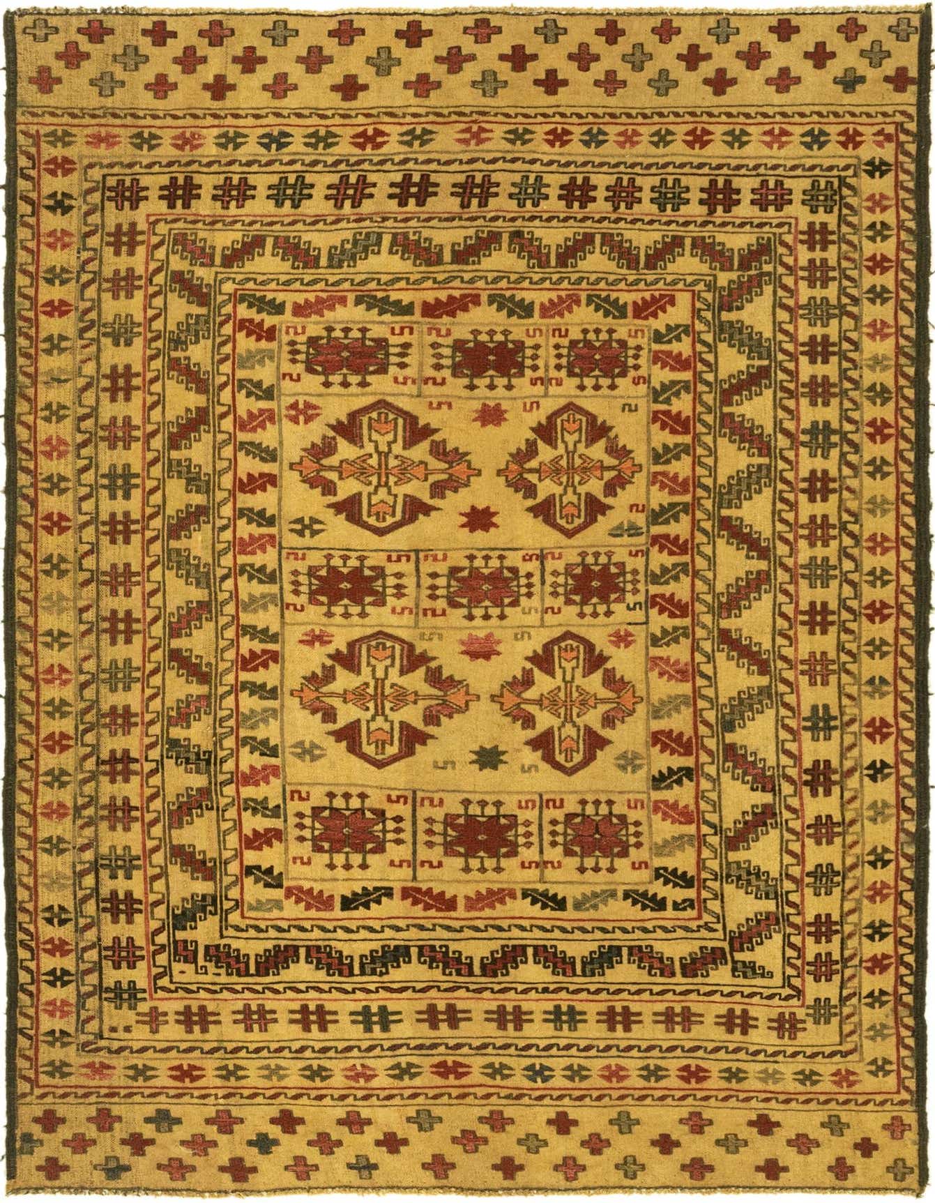 A 4x6 rectangular Sumak rug with a flat pile, featuring traditional tribal patterns in browns, tans, and creams.