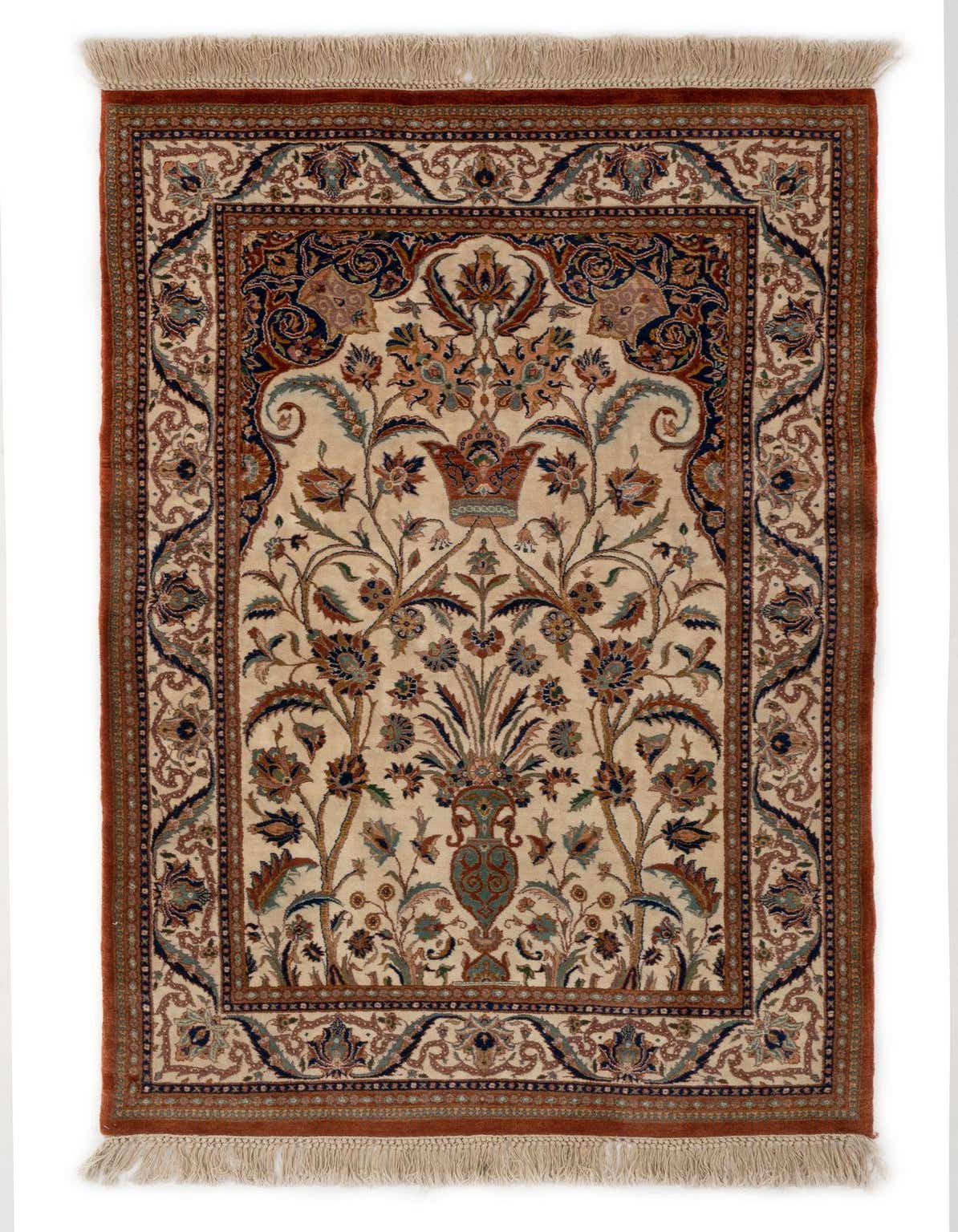 A 3x5 rectangular Tabriz Persian rug with an ivory field, featuring an intricate floral vase design in browns, tans, and blues, with a rust-colored border.