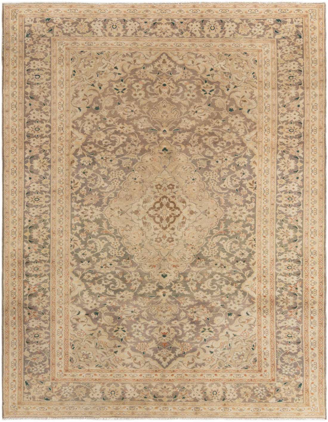 A 6x9 rectangular Tabriz wool rug featuring a traditional medallion and border pattern in shades of brown, tan, and ivory.