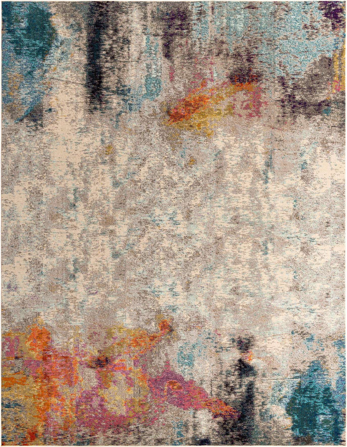 A 10x14 rectangular Rugs.com Theia rug featuring an abstract pattern with browns, tans, creams, and pops of teal, orange, and purple.