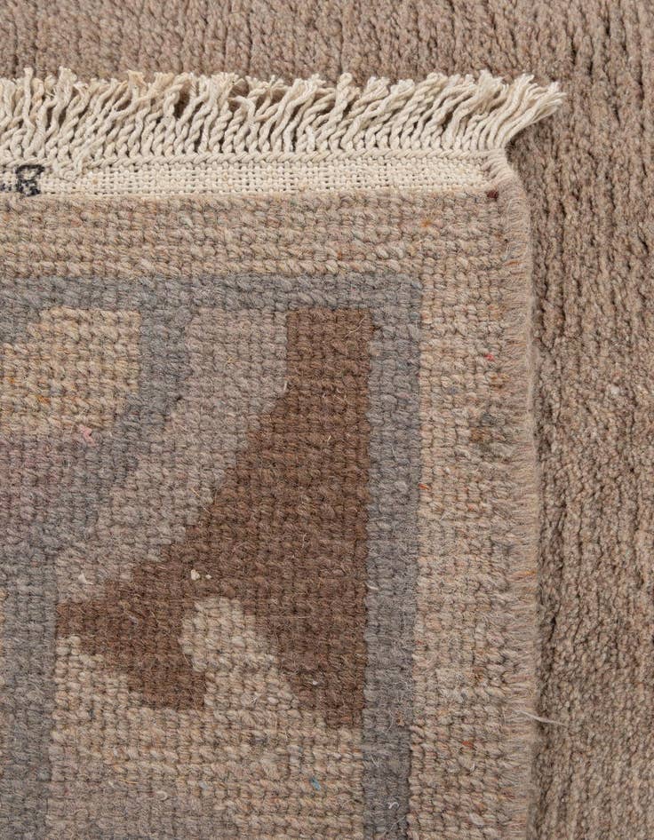 Detail image of  4' 3 x 6' 1  Hand Knotted Tibet Wool Rug