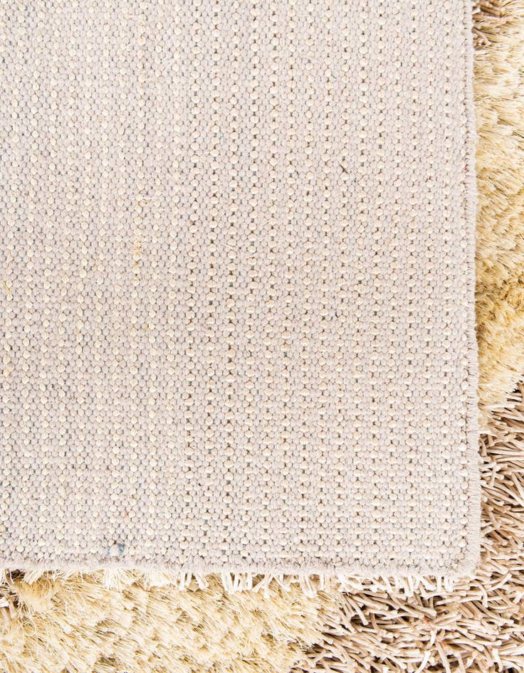 Detail image of  5' x 6' 8  Hand Knotted Two-Tone Shag Rug