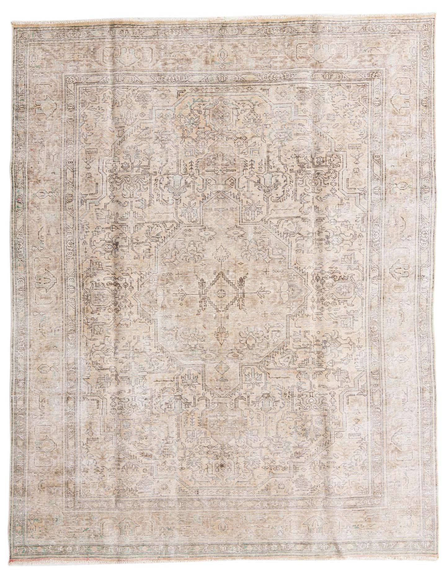 An 8x11 rectangular indoor rug featuring a faded Persian medallion pattern in browns, tans, and ivories.
