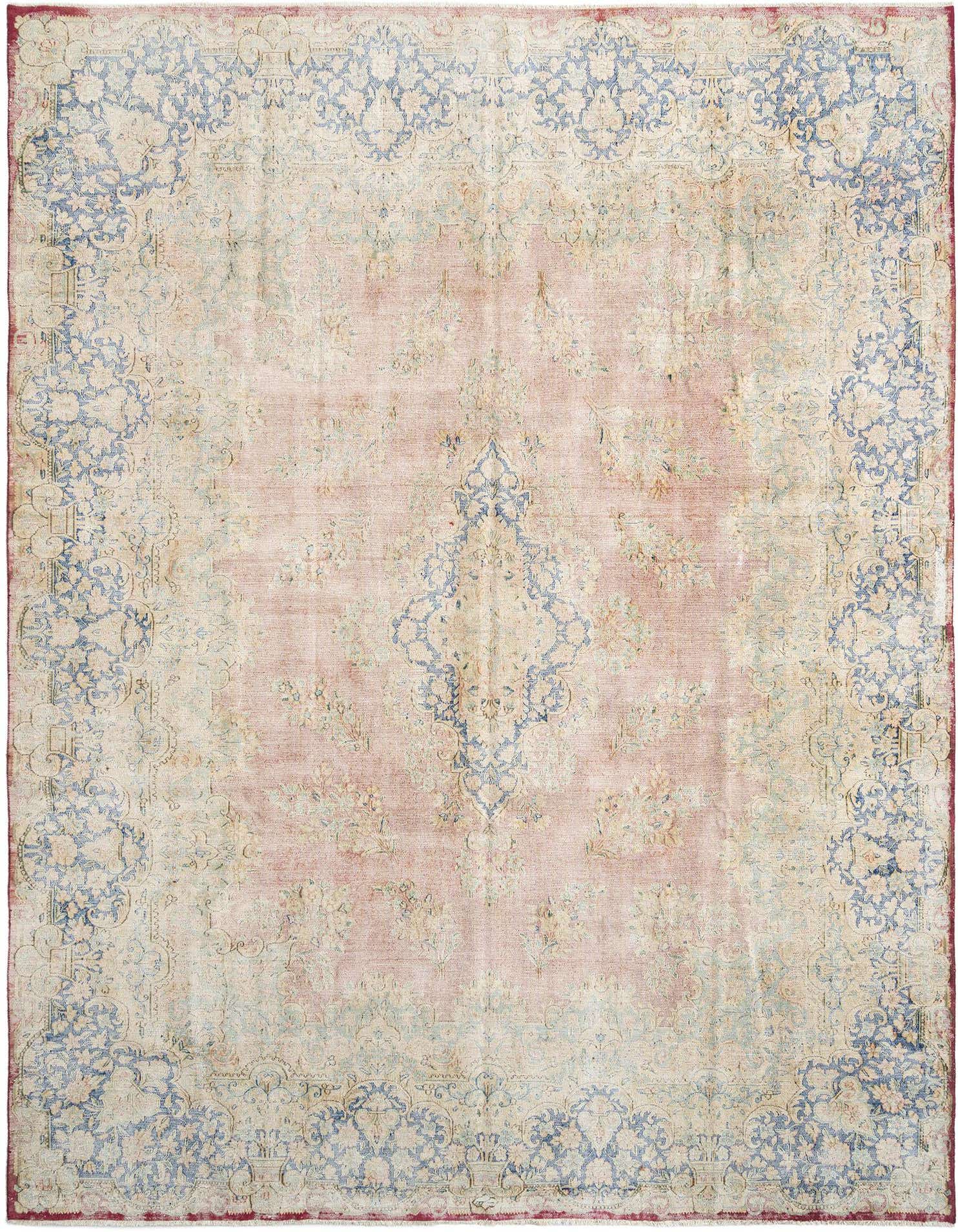 A large 10x13 rectangular Persian rug with a faded pink and brown field, featuring intricate ivory and blue floral patterns.