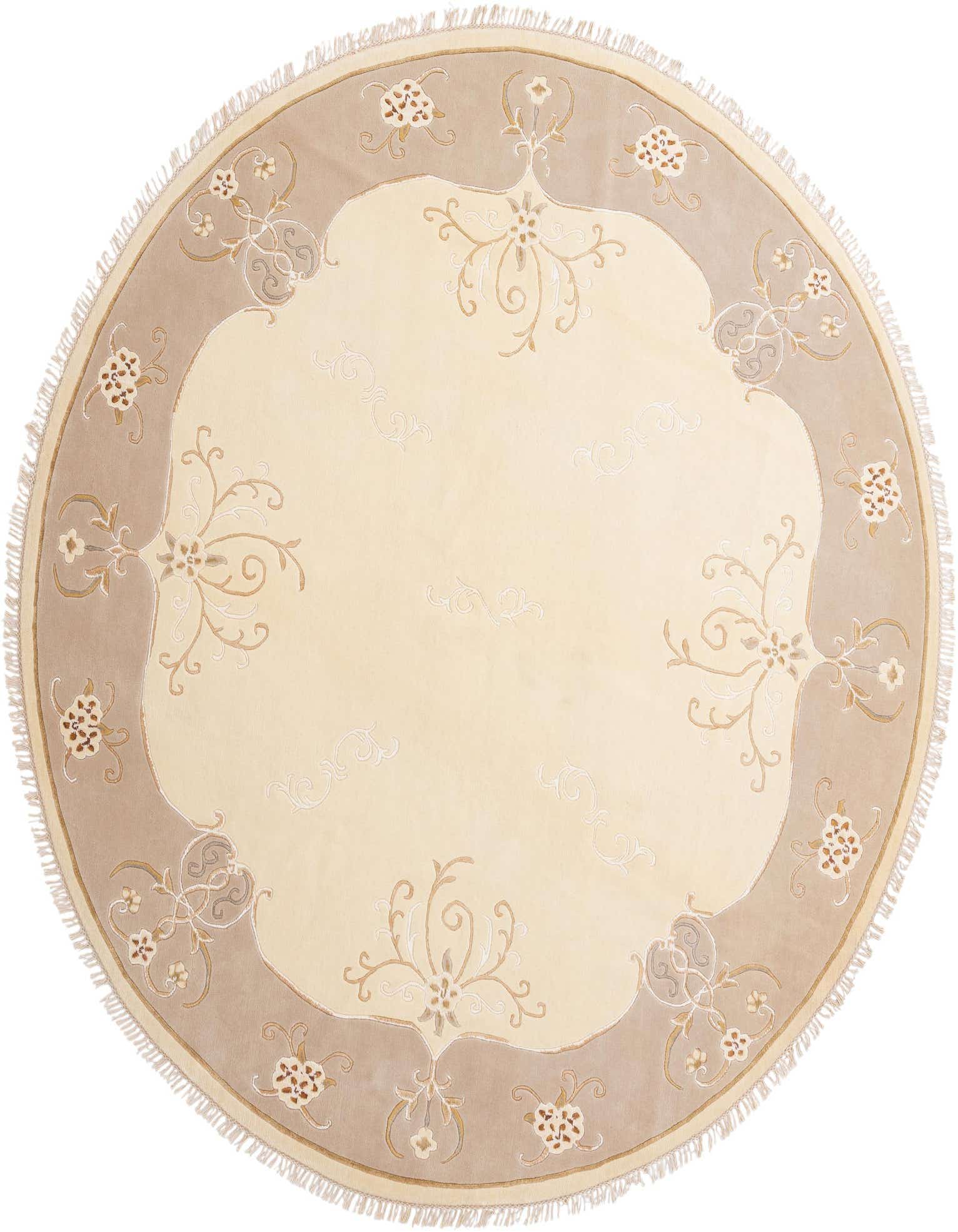 A round Darya rug, 9' 10 in diameter, featuring a cream center with subtle scrollwork and a wide tan border adorned with intricate floral and scroll patterns, all handmade from wool.