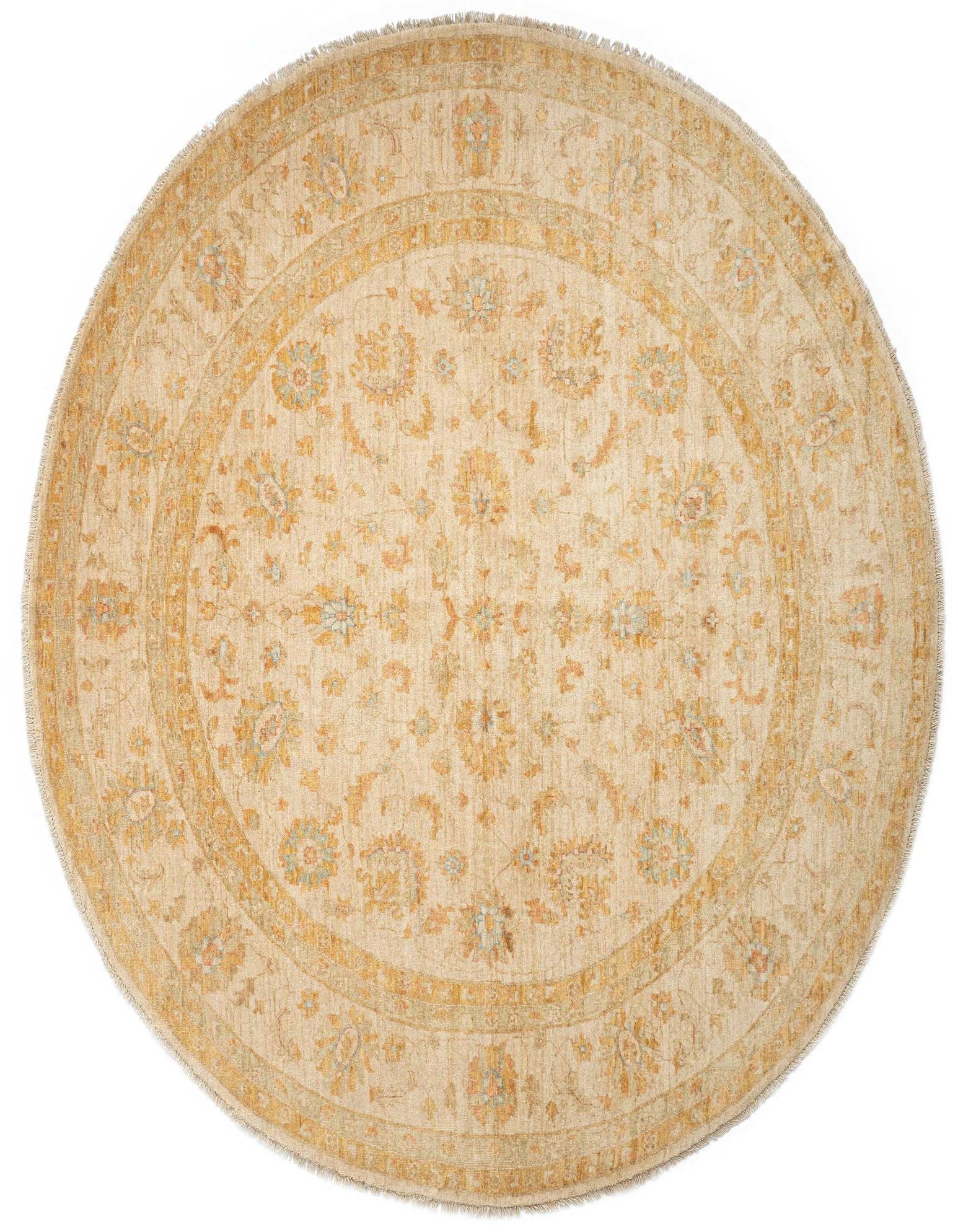 A round, handmade Kaizar Persian rug in warm ivory and tan, featuring an intricate floral medallion pattern and fringed edges.