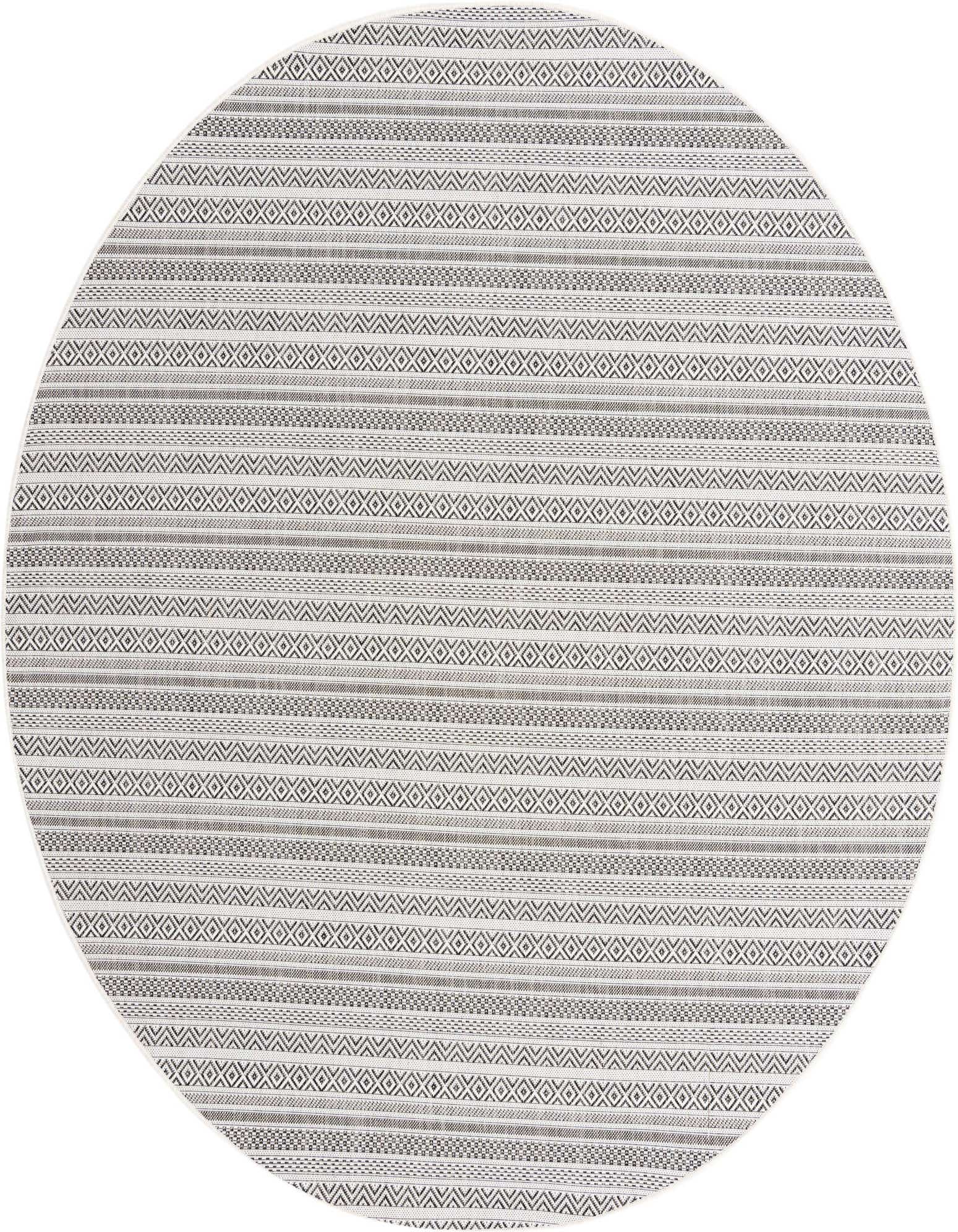 A round 7' 10 x 7' 10 indoor/outdoor rug with a tribal pattern in shades of brown and ivory.