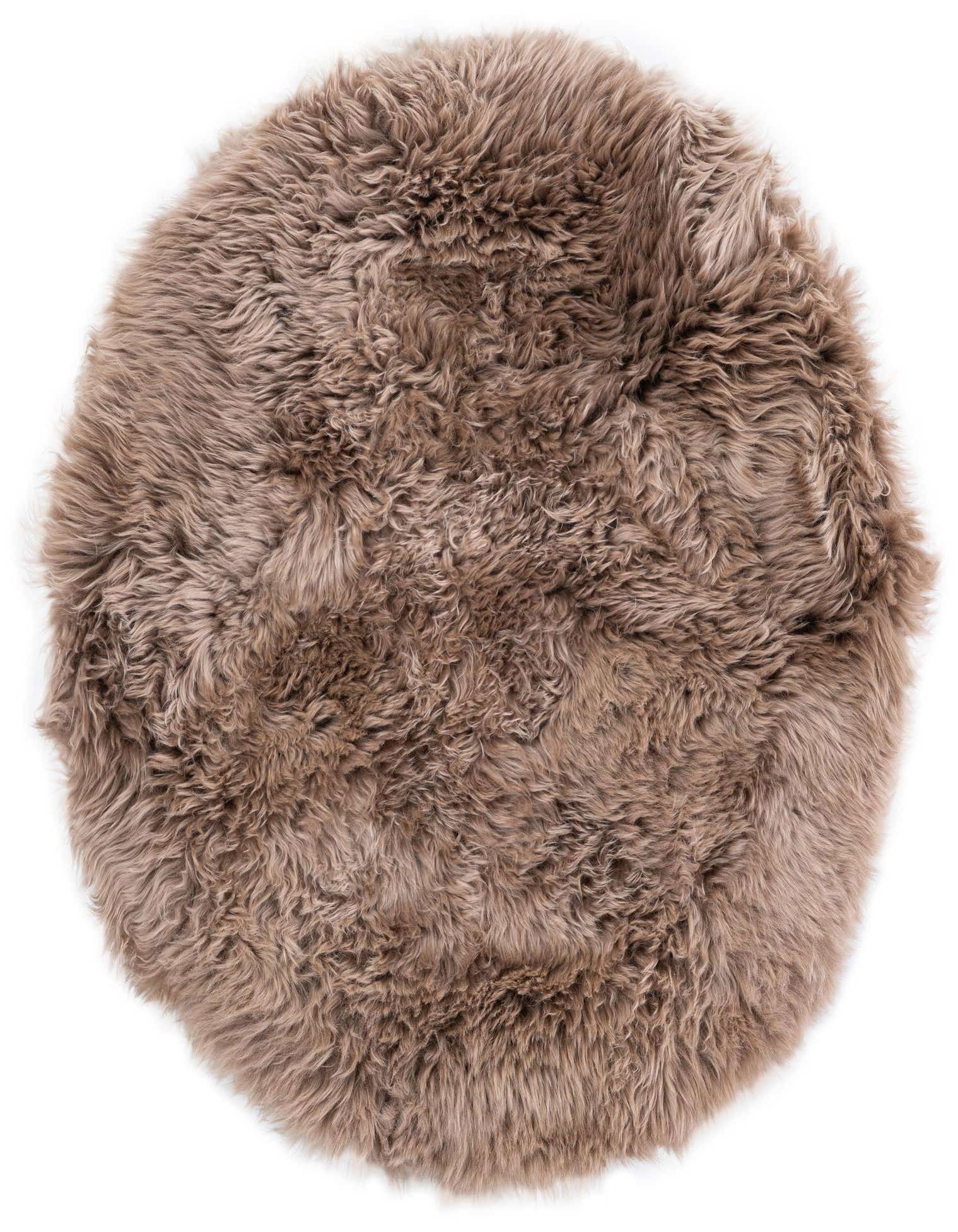 A plush, round 3' 0 x 3' 0 brown and tan lambskin rug with a textured, shaggy pile, perfect for adding warmth.