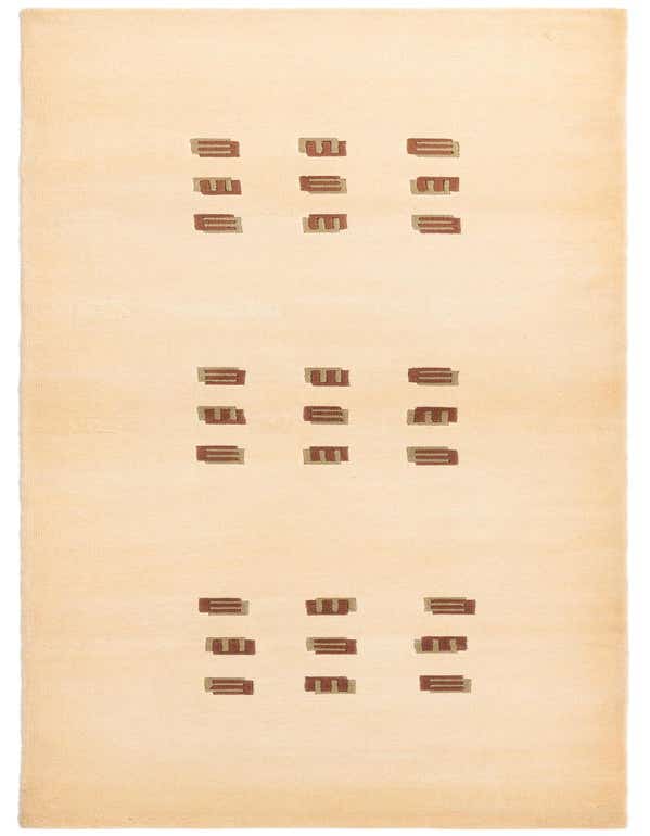 A 9 ft Darya runner rug in cream and brown with a modern geometric pattern, handmade from wool.