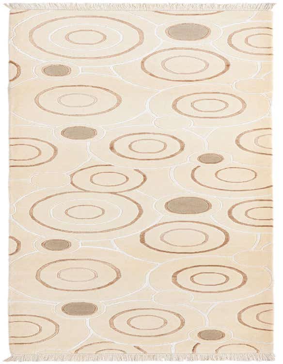 A 10 ft Darya runner rug with a modern circular pattern in shades of brown, tan, and ivory, perfect for a hallway.