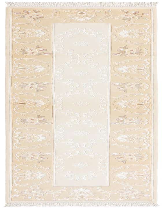 A Darya 10 Ft Runner rug in brown and ivory, featuring a central cream panel with subtle scrollwork and bordered by a tan floral pattern, suitable for a hallway.