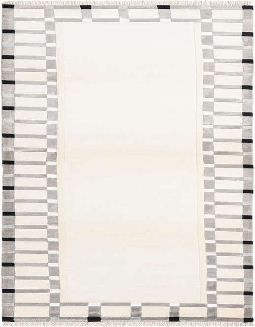 A 10 ft runner rug with a cream center and a modern border of brown, gray, and black squares.