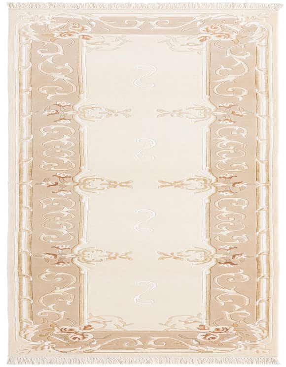 A 10 ft Darya runner rug in ivory and tan with a modern Persian floral and scroll pattern, perfect for a hallway.