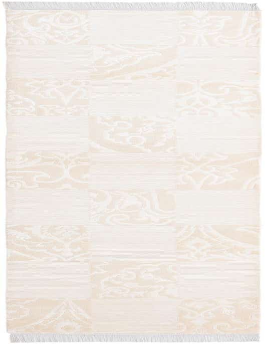 A 10 ft Darya runner rug in brown and ivory, featuring a modern Persian patchwork design with alternating striped and ornate patterns, ideal for a hallway.