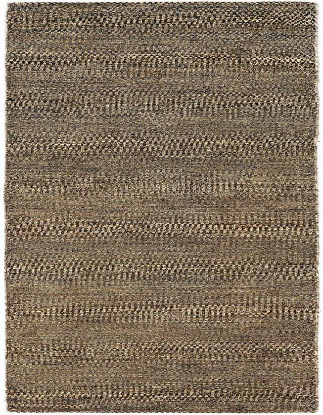 A handmade 8 ft runner rug from the Juma collection, featuring a textured Persian pattern in browns, tans, and ivories, ideal for a hallway or kitchen.
