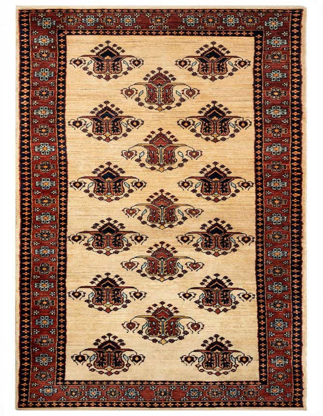 A 10 Ft Luribaft runner rug in cream and brown, featuring traditional Persian floral motifs and a detailed border.
