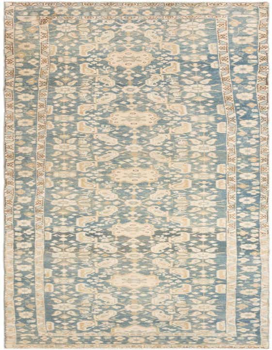 A 12 ft runner rug from the Malayer collection, featuring a traditional tribal pattern in shades of brown, tan, and ivory.