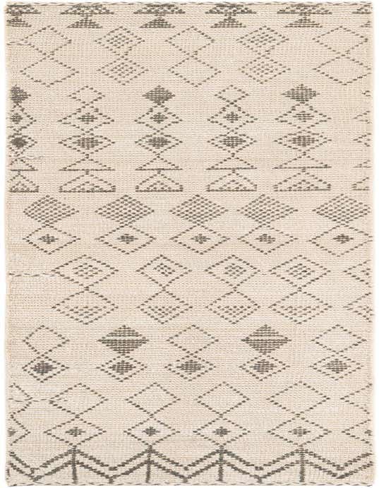 A 10 ft runner rug with a cream background and a repeating pattern of brown tribal diamonds and triangles.