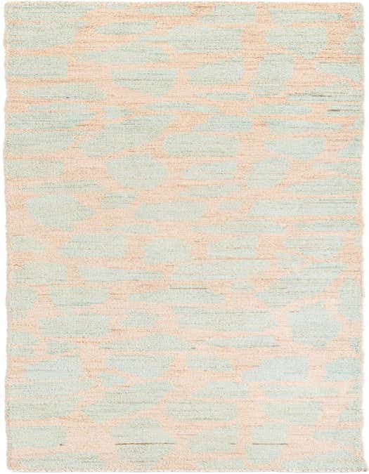 A 10 ft runner rug featuring an abstract tribal pattern in light brown and cream, perfect for a hallway.