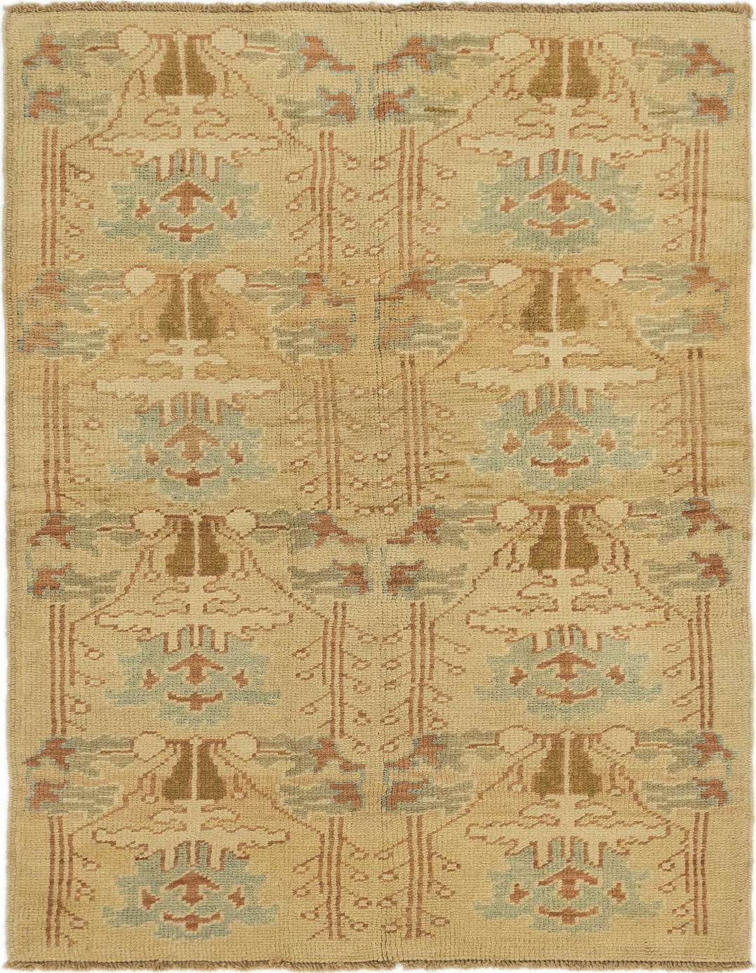 An 8 ft runner rug featuring a transitional tribal pattern in browns, tans, and creams, ideal for a hallway or kitchen.