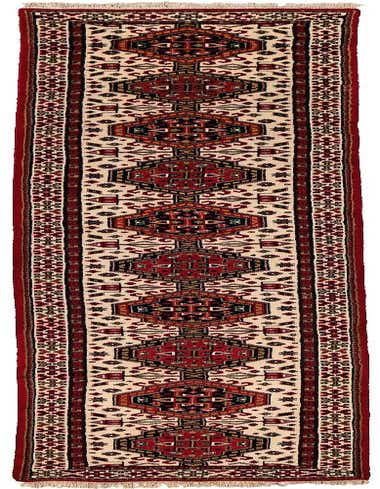 A 13 ft handmade wool runner rug with a traditional geometric pattern in cream, red, and brown, perfect for a hallway.