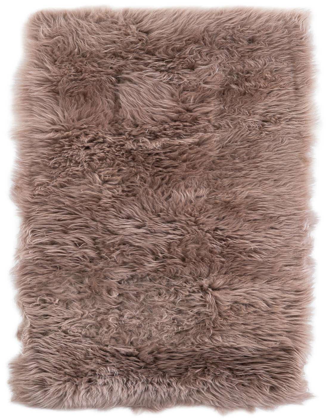 A soft, plush 4 ft runner rug in a warm brown hue, made of lambskin, perfect for a cozy hallway.