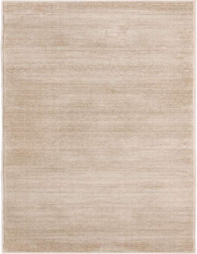 An 8 ft runner rug from the Uptown collection, featuring a textured, solid brown and tan design, ideal for a hallway.