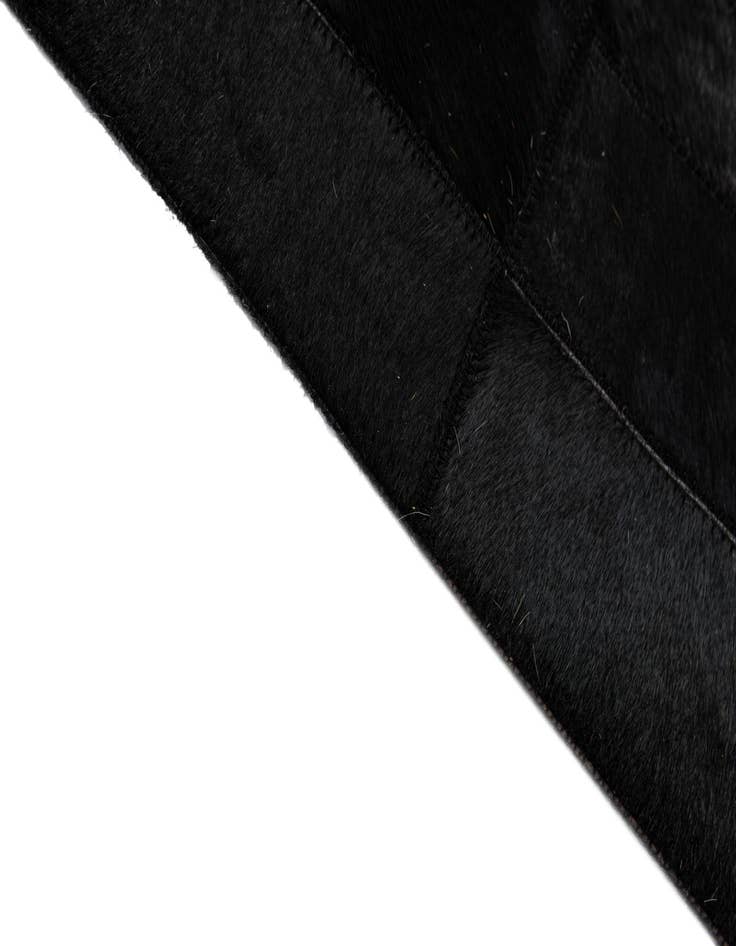 Detail image of  5' 1 x 7' 11 Cowhide - Patchwork Rug