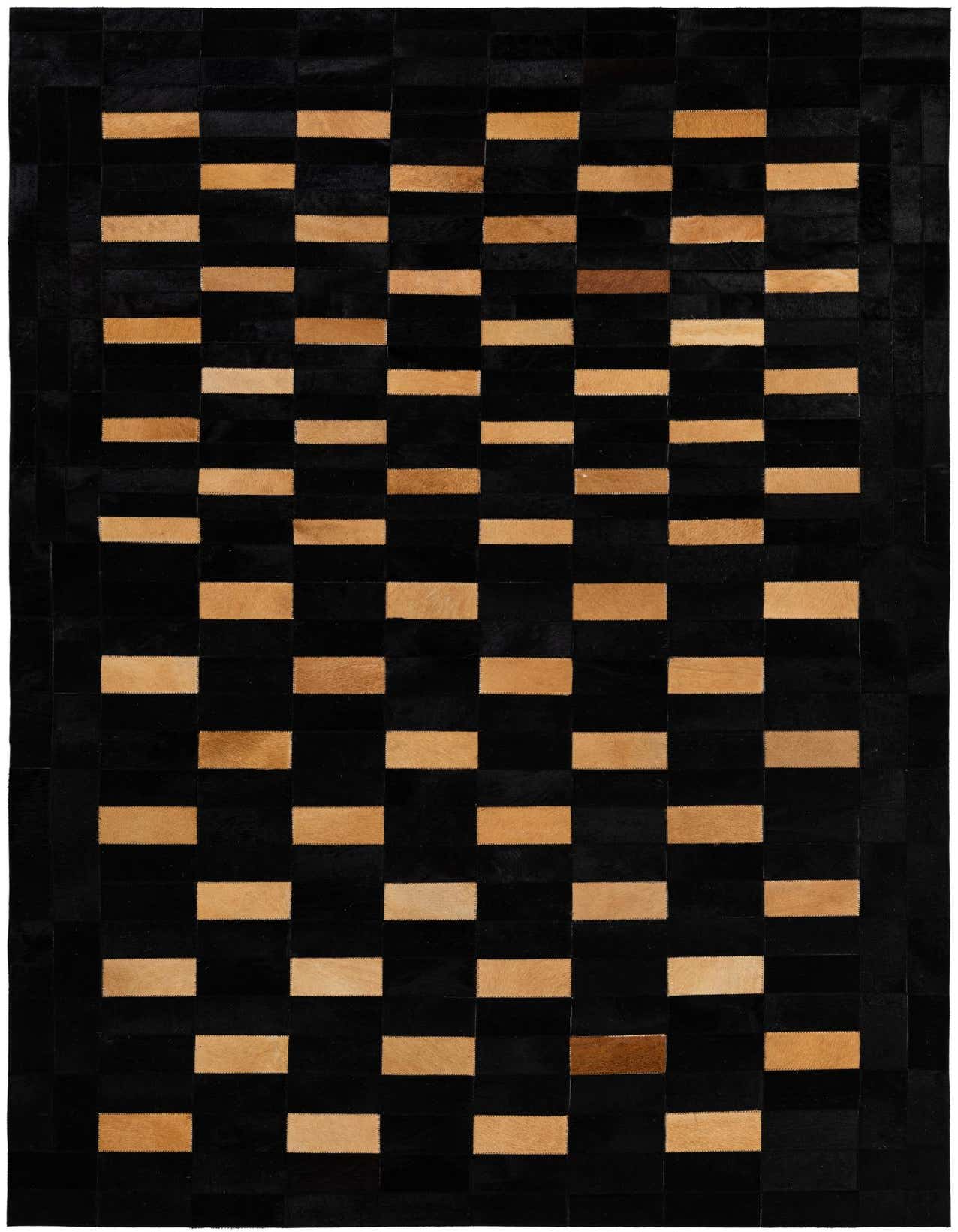 A 5x8 rectangular black and light brown cowhide rug with a modern patchwork design, ideal for a living room.