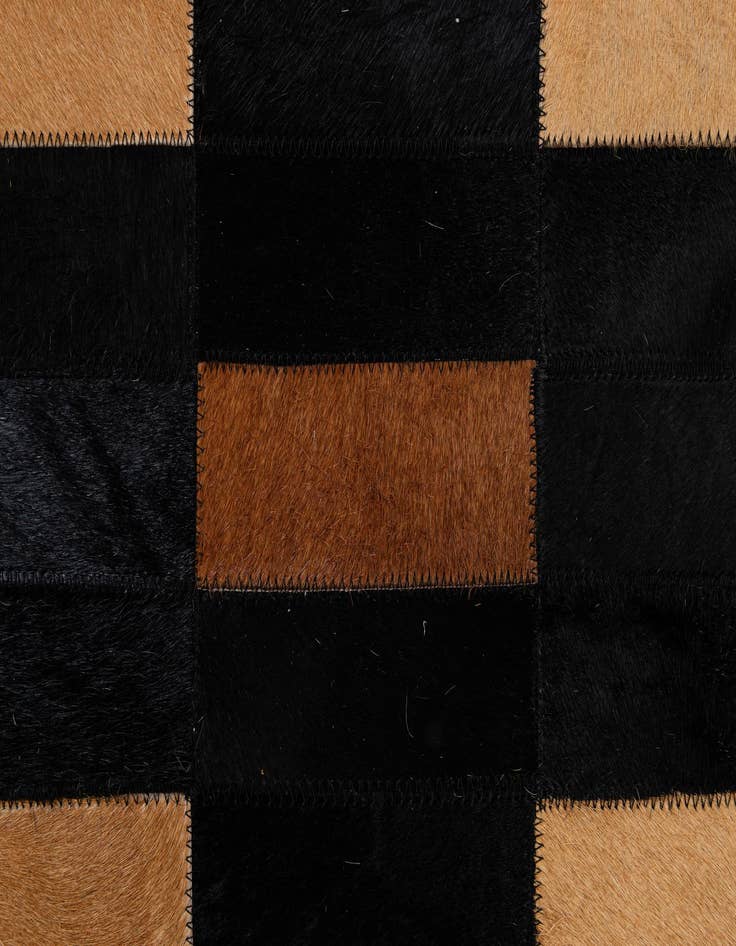 Detail image of  5' 1 x 7' 11 Cowhide - Patchwork Rug