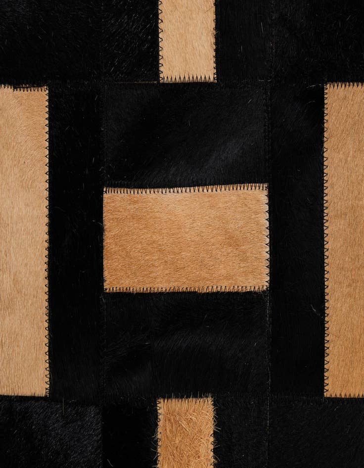 Detail image of  5' 1 x 7' 11 Cowhide - Patchwork Rug