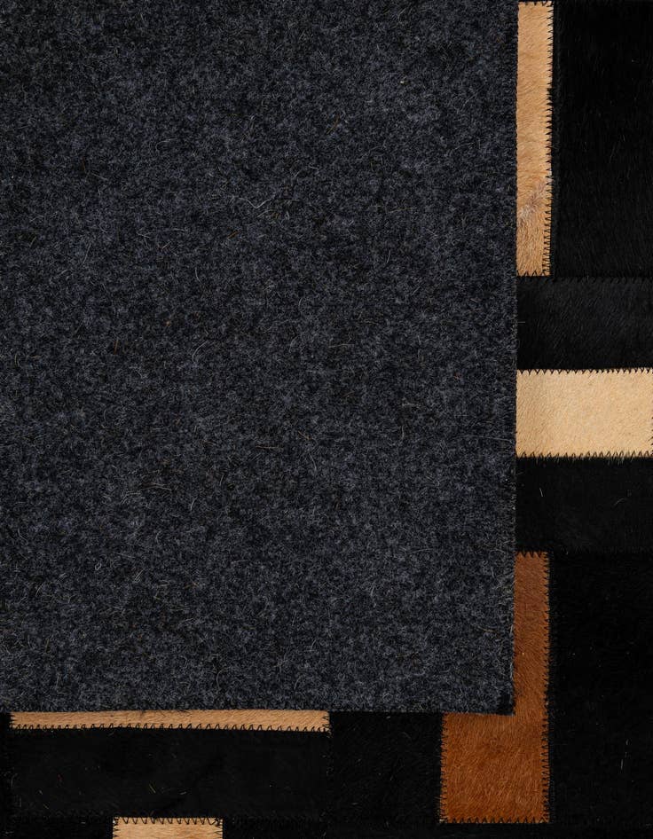 Detail image of  5' 1 x 7' 11 Cowhide - Patchwork Rug