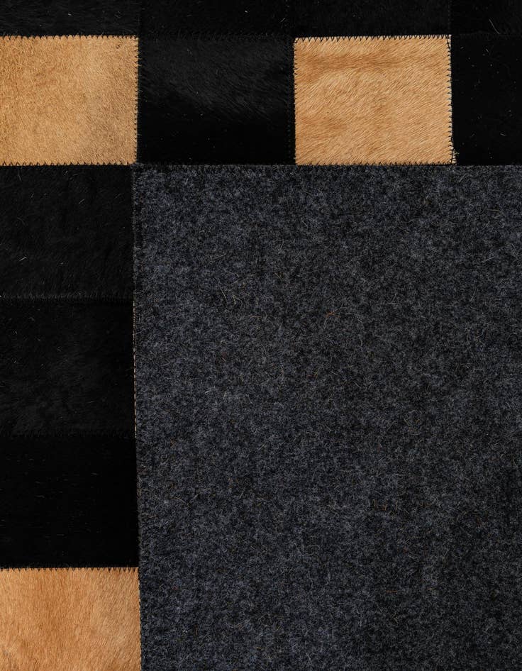 Detail image of  5' x 7' 11 Cowhide - Patchwork Rug