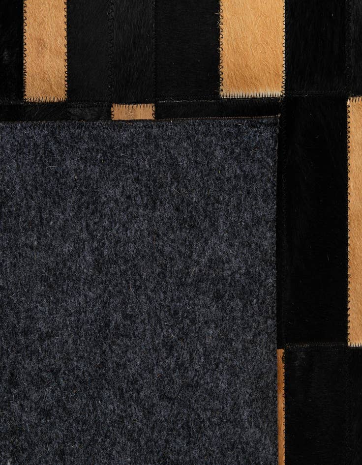 Detail image of  5' 1 x 8' Cowhide - Patchwork Rug