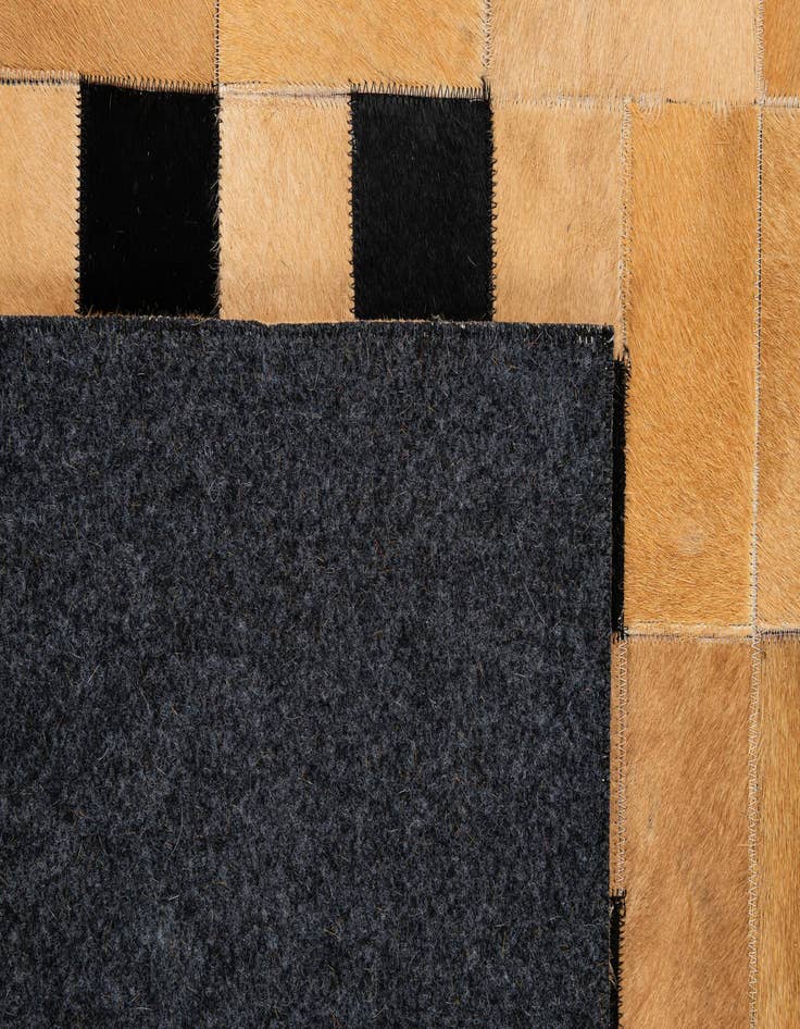 Detail image of  5' 1 x 8' Cowhide - Patchwork Rug