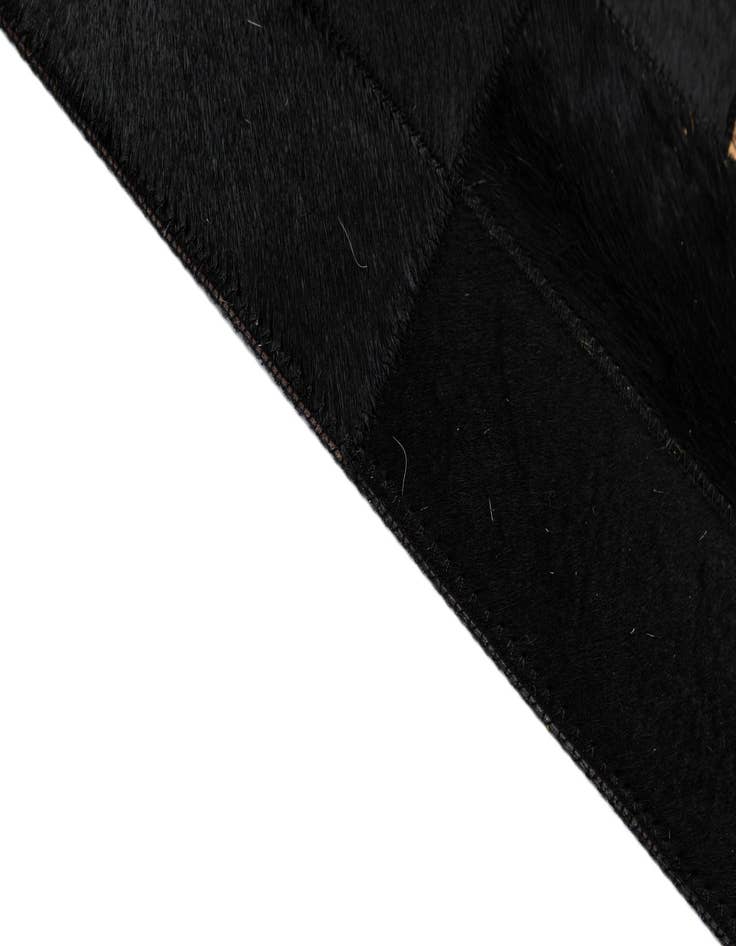 Detail image of  5' 1 x 7' 11 Cowhide - Patchwork Rug