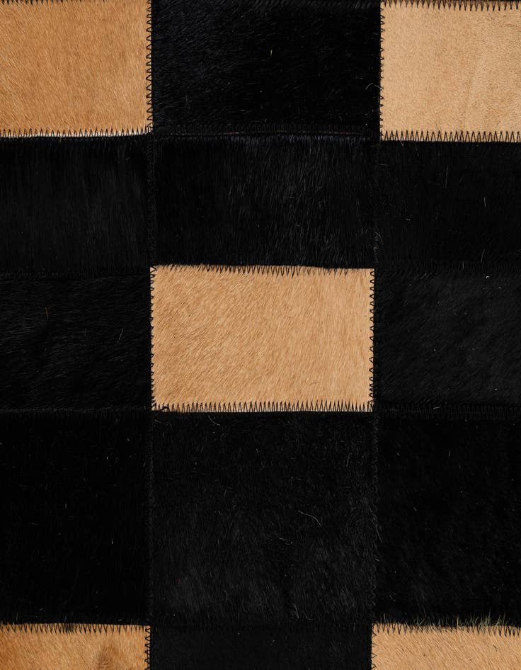 Detail image of  5' 1 x 7' 11 Cowhide - Patchwork Rug