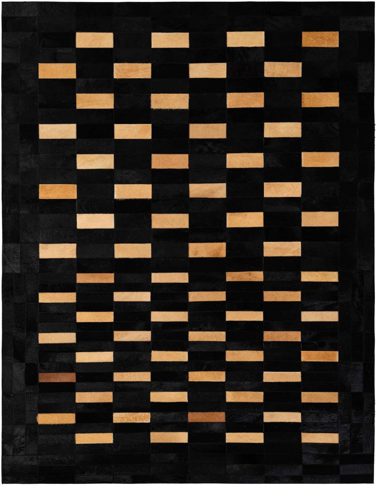 A 5x8 rectangular black and natural cowhide rug with a modern striped patchwork pattern, ideal for a living room.