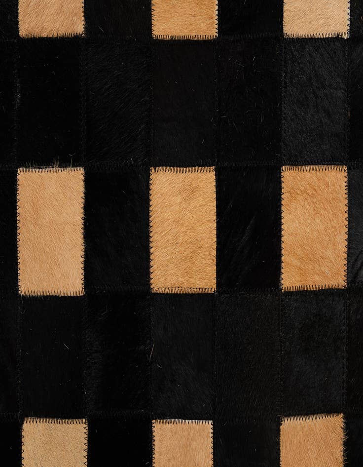 Detail image of  5' 1 x 7' 11 Cowhide - Patchwork Rug