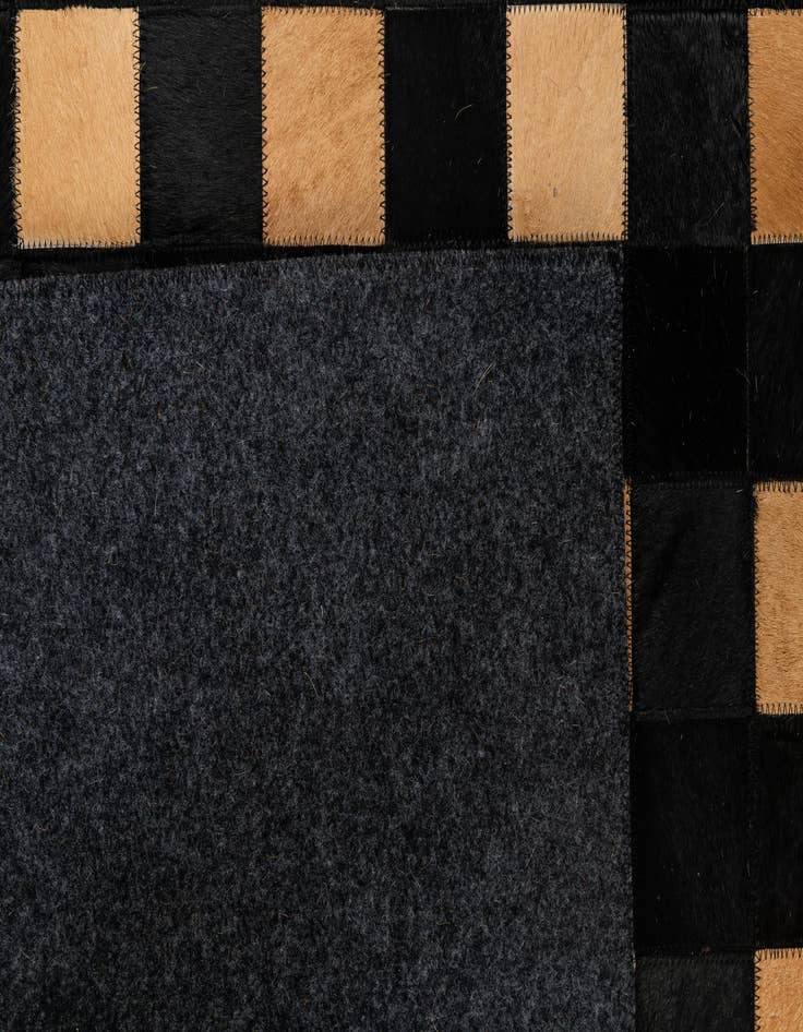 Detail image of  5' 1 x 7' 11 Cowhide - Patchwork Rug
