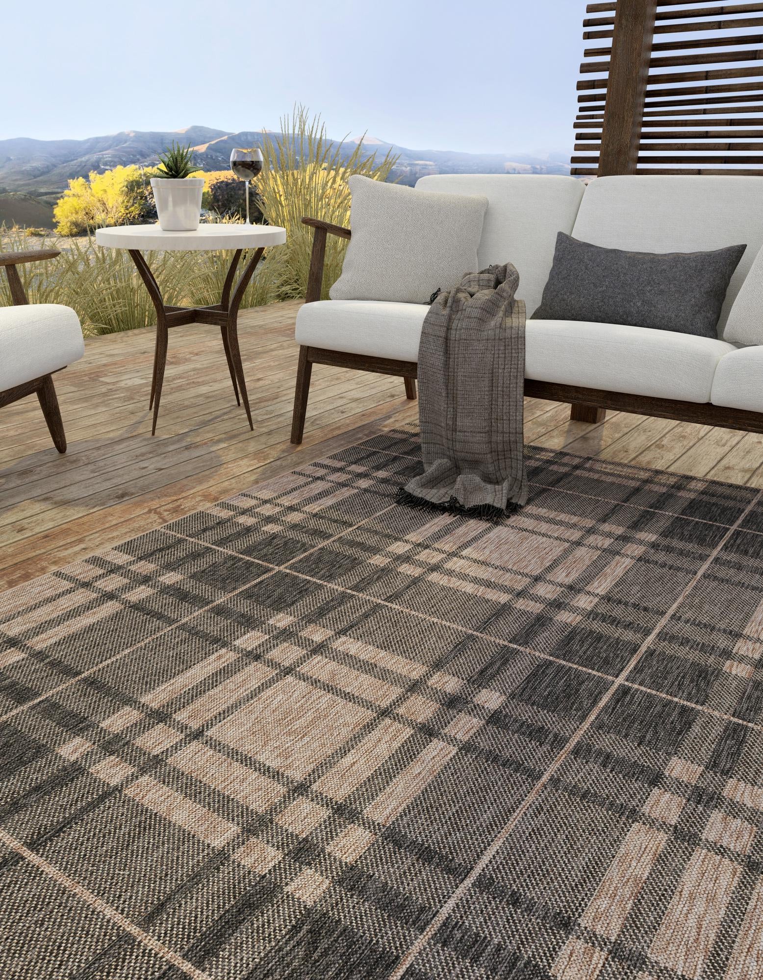 Black and Brown 2' x 3' Checkered Indoor / Outdoor Rug